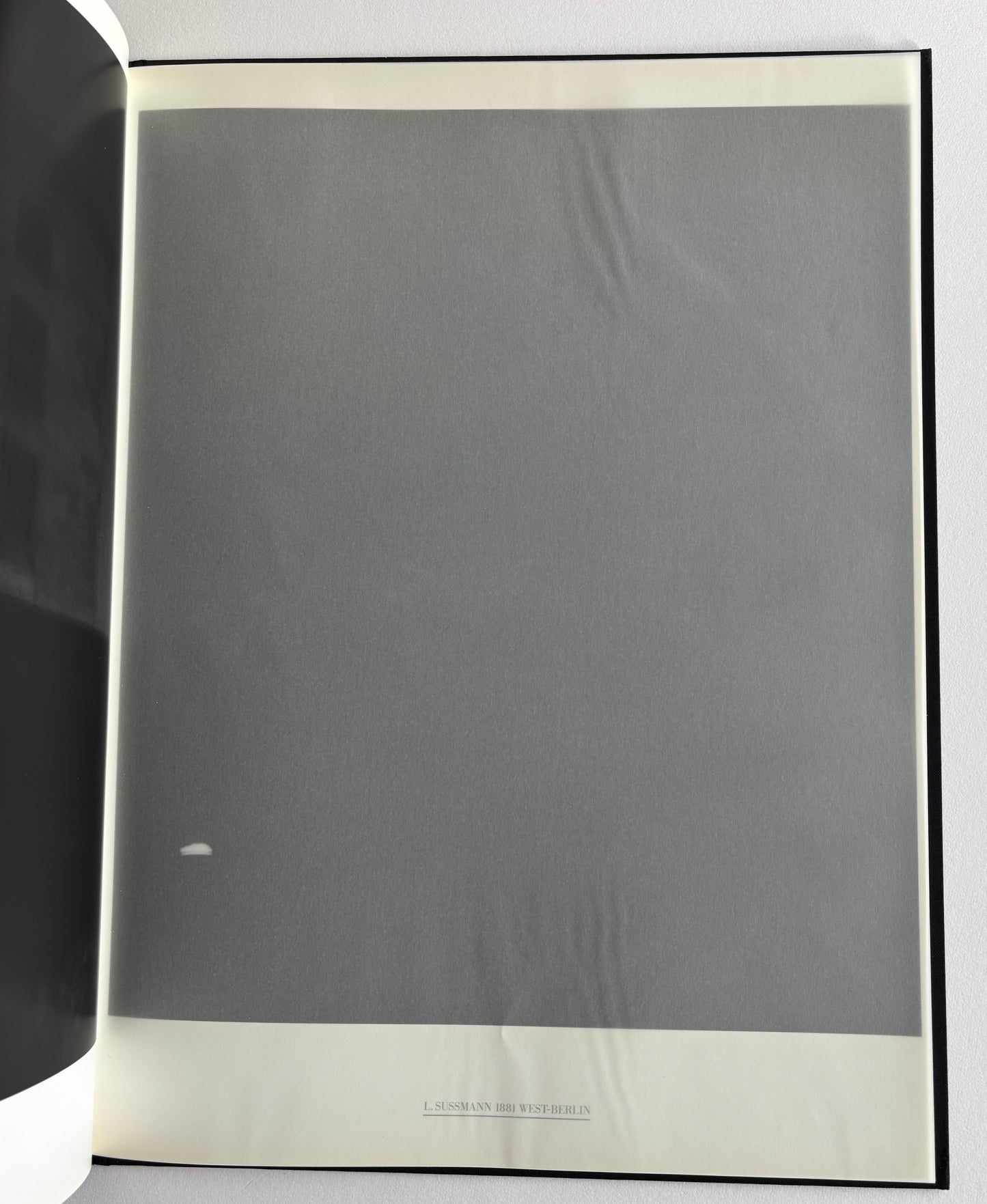 Stadt des Schwarz. Eighteen Photographs of Berlin by John Gossage. (SIGNED and NUMBERED)