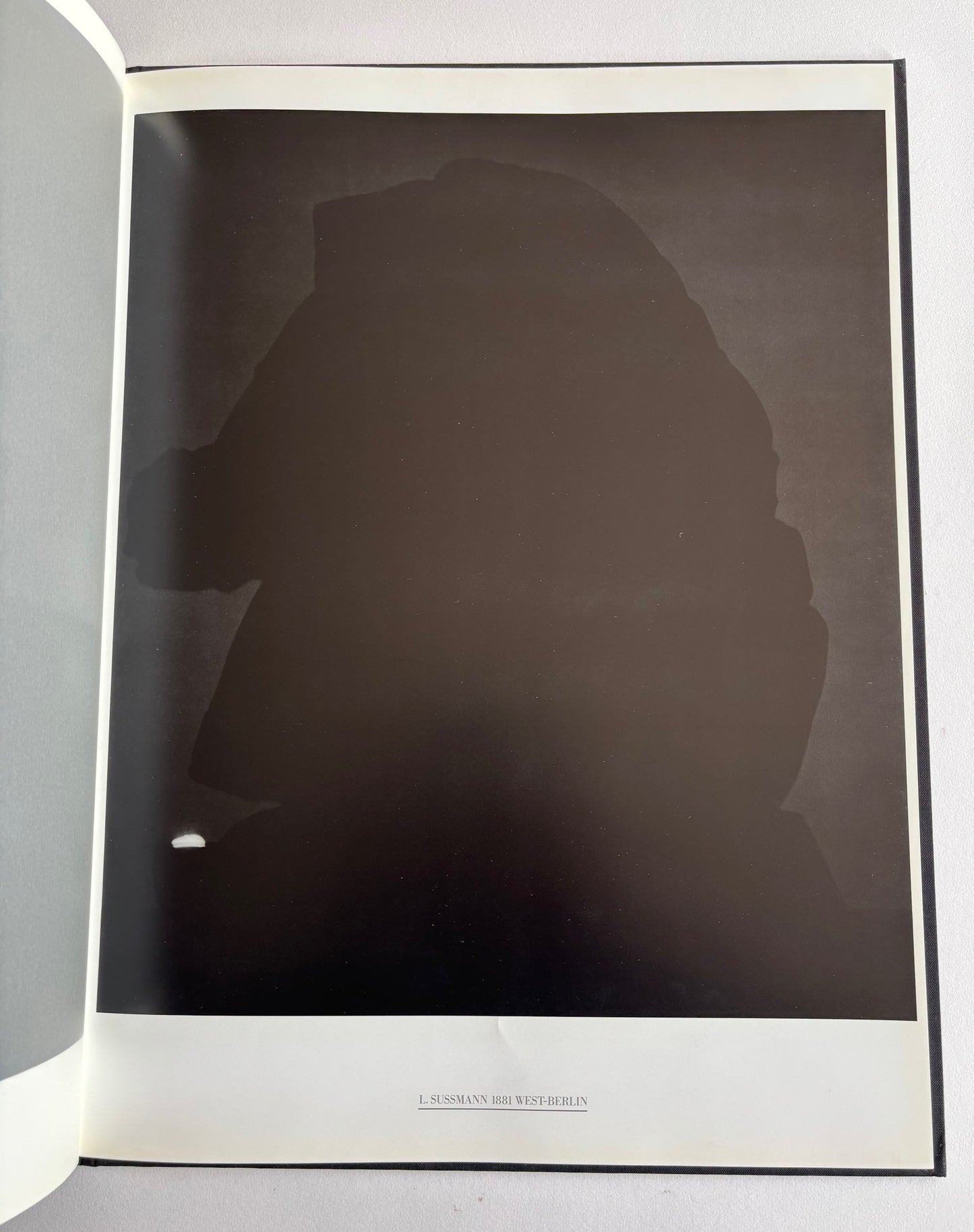 Stadt des Schwarz. Eighteen Photographs of Berlin by John Gossage. (SIGNED and NUMBERED)