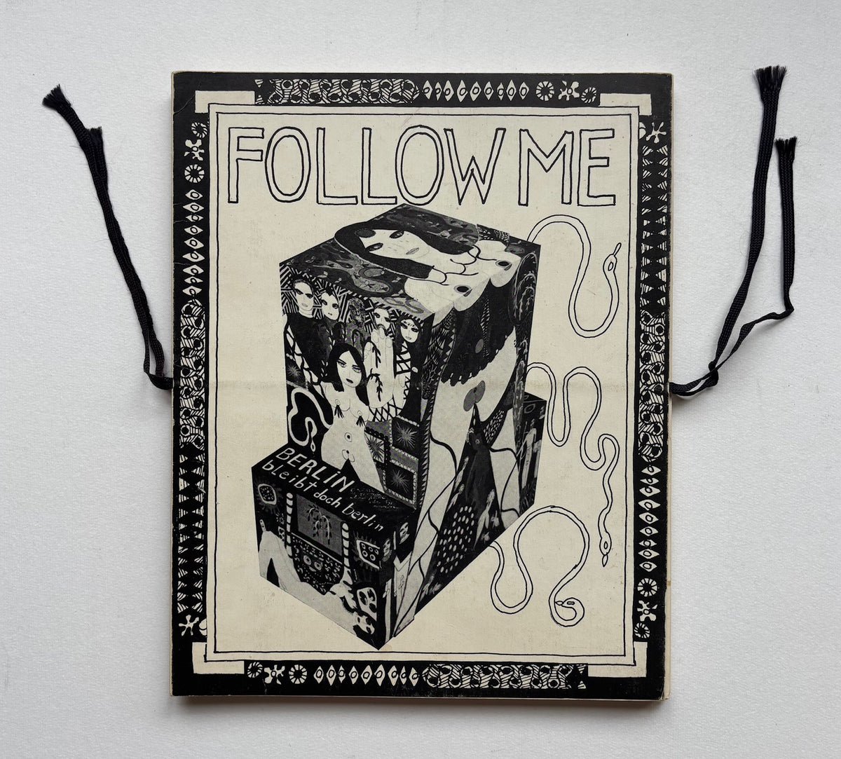 FOLLOW ME. (SIGNED)